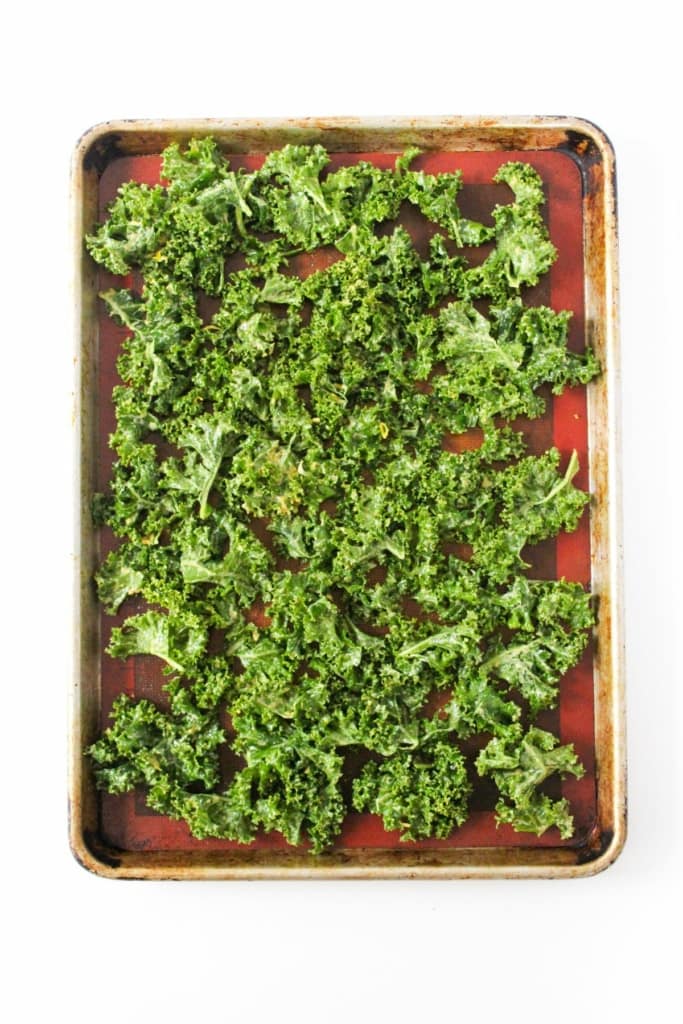 kale leaves on a baking sheet