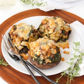 gluten free stuffed portobello mushroom side dish on a plate