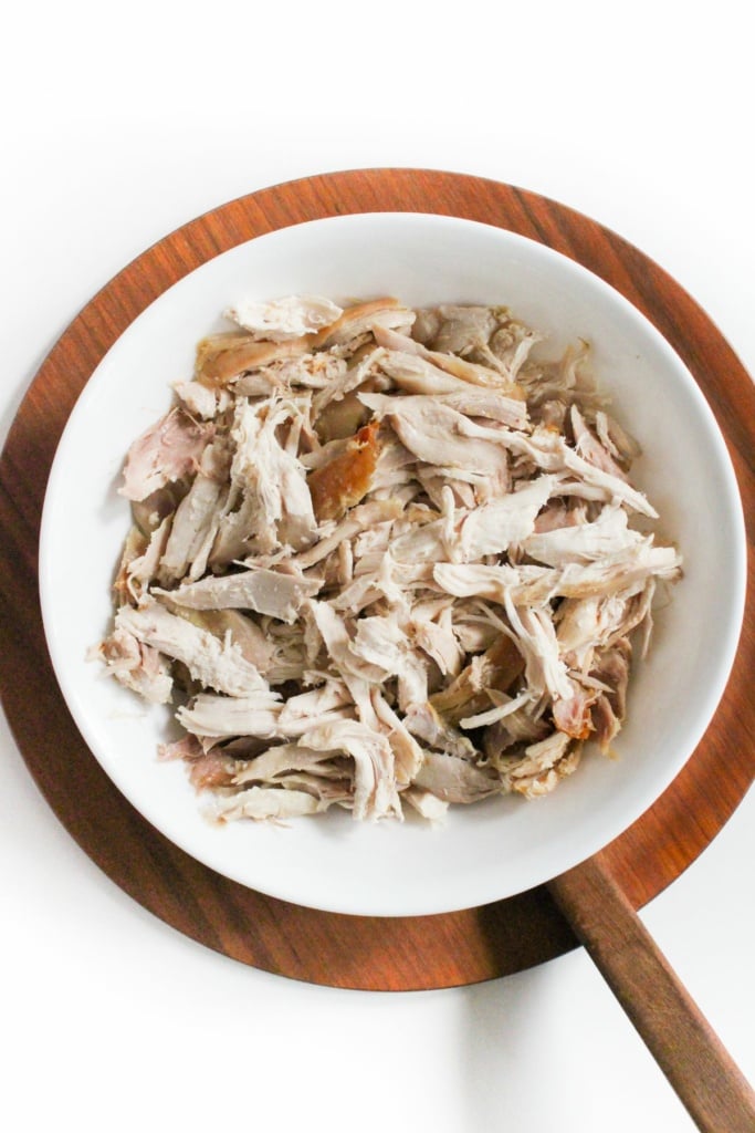 shredded chicken in a white bowl