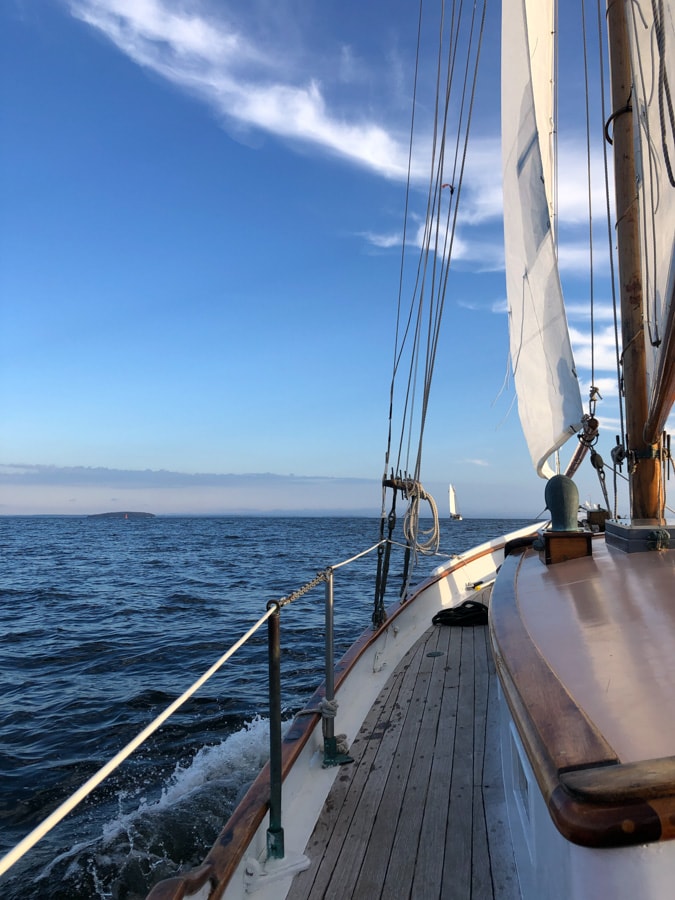 view of the water from a sailboat near camden maine