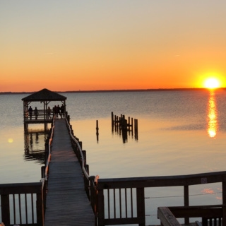 sunset view over the boardwalk in duck nc