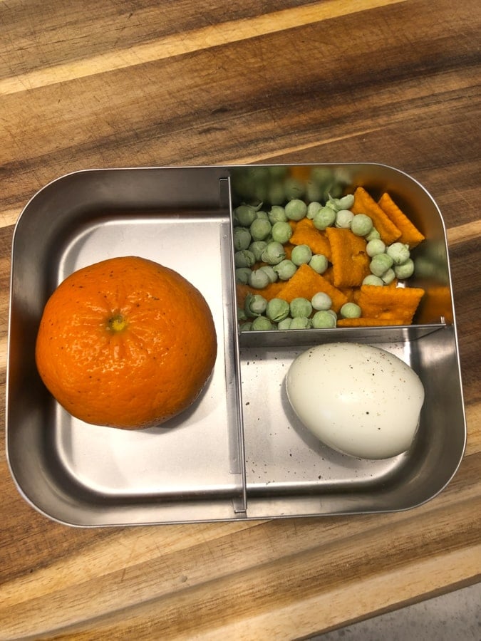 clementine, boiled egg, peas