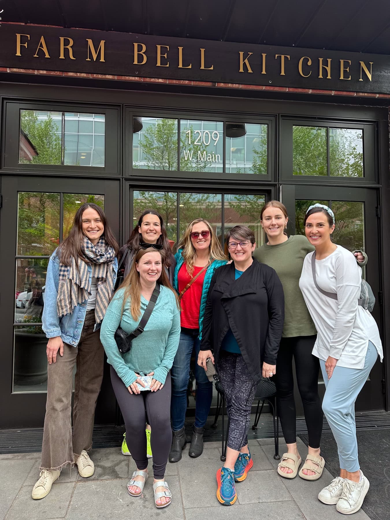 posing outside farm bell kitchen