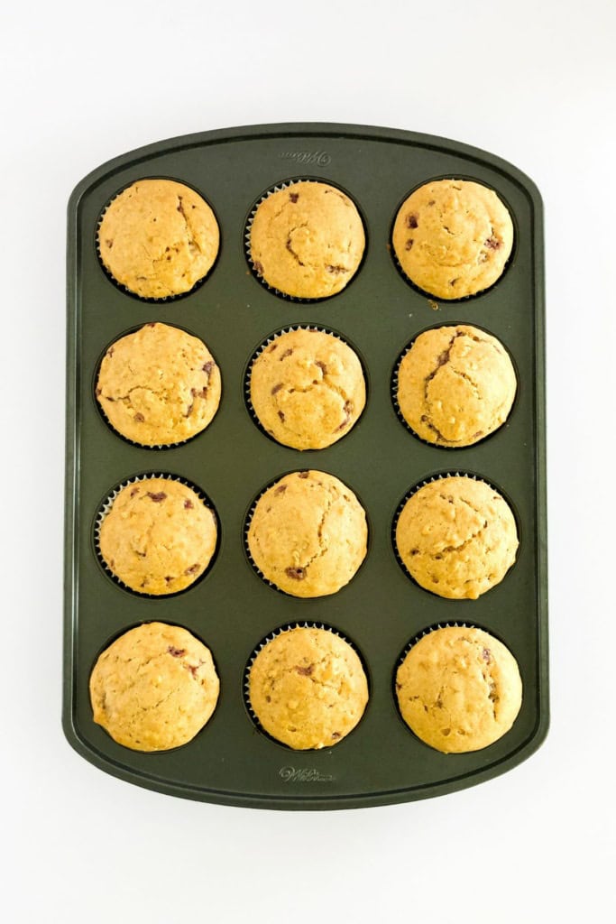 baked peanut butter jelly muffins in a muffin tin