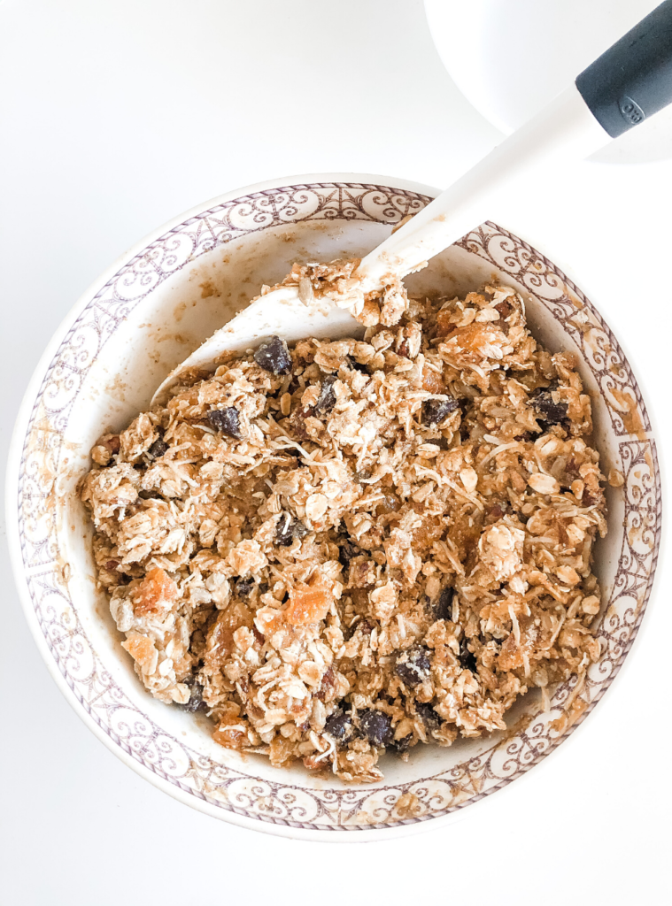 mixing granola bar ingredients in a bowl